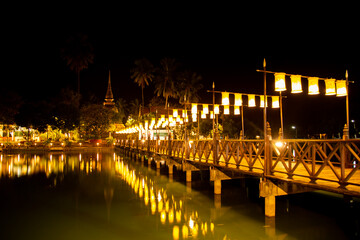 Obraz na płótnie Canvas Wat Traphang Thong temple at night in Sukhothai historical park, Thailand