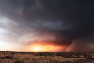 Ominous supercell storm clouds at sunset