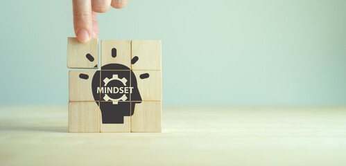 Business mindset and success concept. Growth and personal development. Believing in yourself matters. New mindset new results. Placing wooden cubes with changing mindset icon on smart background. - obrazy, fototapety, plakaty
