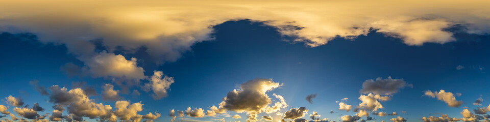 Dark blue sunset sky panorama with Cumulus clouds. Seamless hdr pano in spherical equirectangular format. Complete zenith for 3D visualization, game and sky replacement for aerial drone 360 panoramas.