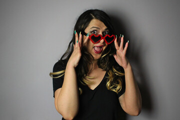 woman in heart shapped glasses