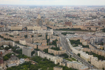 Fototapeta premium Aerial view of city Moscow in summer. Form from the observation platform of the business center of Federation Tower Moscow City. Photography from a height of 374 meters.