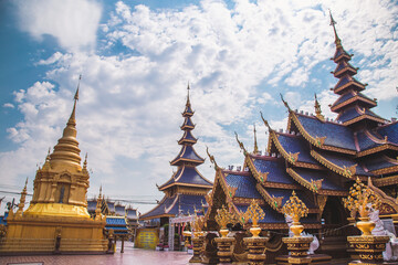 Fototapeta premium Wat Phiphat Mongkhon blue temple in Sukhothai, Thailand
