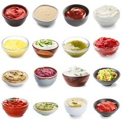 Set of different tasty sauces in bowls on white background