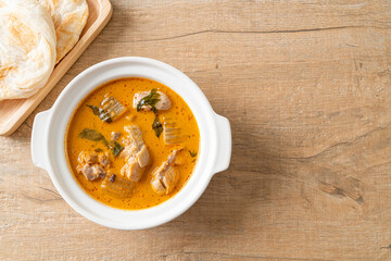 Chicken curry soup with roti