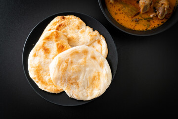 Chicken curry soup with roti