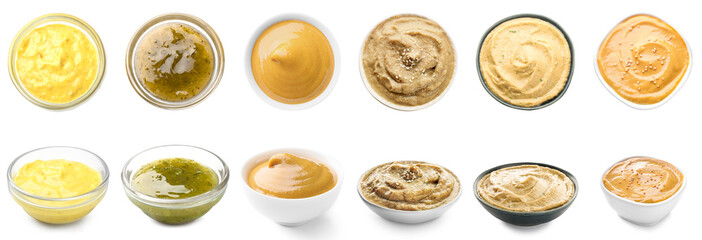 Set of different tasty sauces in bowls on white background