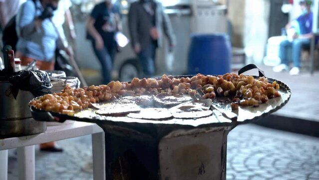Cooking some delicious street food enchiladas in Guanajuato, Mexico