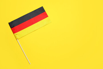 National flag of Germany on yellow background