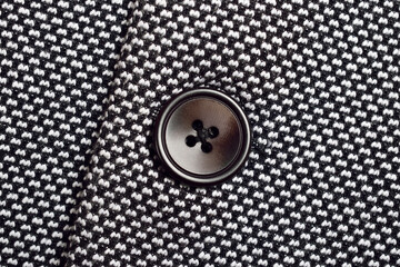 Closeup of Button on grey suit