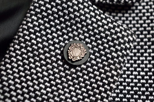 Closeup Of Lapel Pin On Blazer