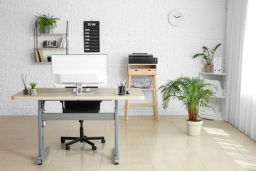 Fototapeta premium Interior of office with modern workplace