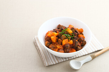 Sambal Goreng Ati Kentang, javanese (Indonesia) traditional food. Served in white bowl