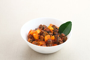 Sambal Goreng Ati Kentang, javanese (Indonesia) traditional food. Served in white bowl