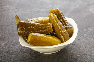 Marinated pickled cucumbers in the bowl