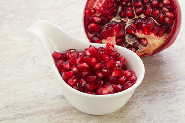 Ripe red Pomegranate seeds in the bowl