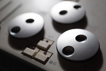 Top closeup shot of an equalizer music instrument.