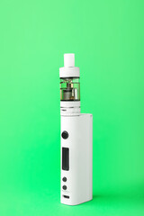 Modern vape mod on green background