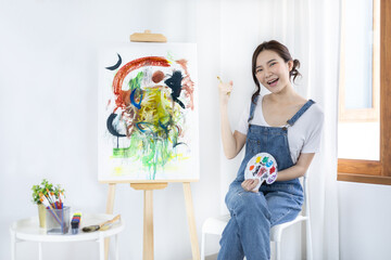Female artist painting on canvas, Artist studio interior, Draw with watercolor, Drawing supplies ,...