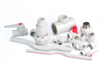 Plumbing fixtures and piping parts plastic fittings isolated on a white background