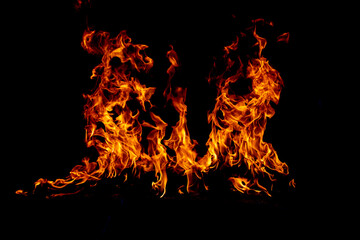 Obraz premium Flame fires. Burn lights on a black background. Fire flames on black background. Abstract fire flame background.