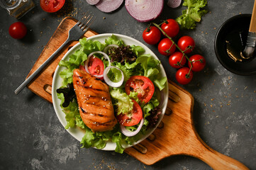 Healthy food. Grilled chicken breast with salad vegetables