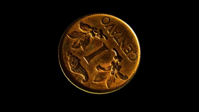 Rotating reverse of Columbia coin, 1 centavo 1969. Isolated in black background. 