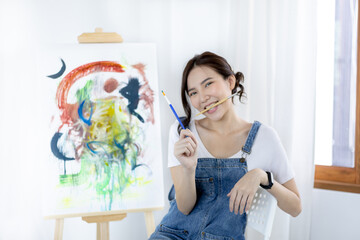 Female artist painting on canvas, Artist studio interior, Draw with watercolor, Drawing supplies ,...