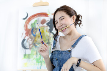 Female artist painting on canvas, Artist studio interior, Draw with watercolor, Drawing supplies ,...