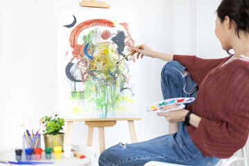 Female artist painting on canvas, Artist studio interior, Draw with watercolor, Drawing supplies ,...
