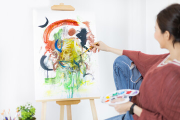 Female artist painting on canvas, Artist studio interior, Draw with watercolor, Drawing supplies ,...