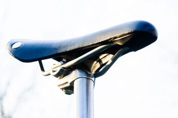 close up saddle and post of fixed gear bike, old vintage bicycle