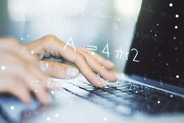 Creative scientific formula concept with hands typing on laptop on background. Multiexposure