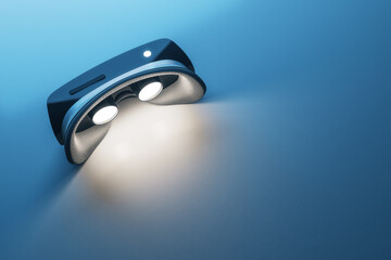 Virtual reality concept with glow inside black VR helmet on abstract blue background. 3D rendering