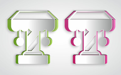 Paper cut Attraction carousel icon isolated on grey background. Amusement park. Childrens entertainment playground, recreation park. Paper art style. Vector