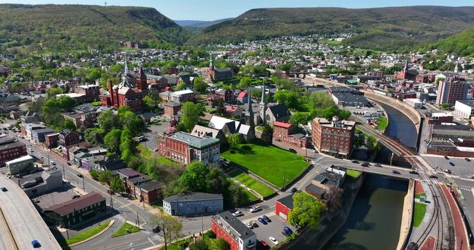 Epic aerial of Western Maryland, Cumberland in Allegany County. Canal and Potomac River, Interstate 68. Aerial drone view.