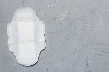 Women hygiene products or sanitary pad on colored background. Pastel color. Closeup. Empty place for text. Female daily hygiene © sosiukin