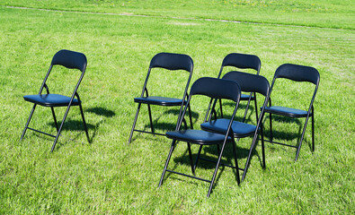 office chairs on the grass for conferences