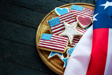 Fototapeta premium home baking cookies icing like american flag. patriotic background for US national holidays, happy Memorial Day 