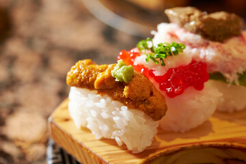 Salmon roe sushi, sea urchin roe sushi on a plate