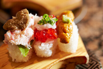 Salmon roe sushi, sea urchin roe sushi on a plate