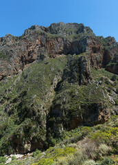 Fototapeta na wymiar High rock cliffs at Topolia Gorge, Crete, Greece.