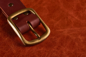 Buckle in solid brass with traces of patina.