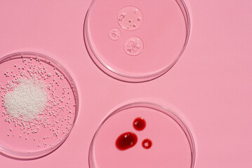 Cosmetic swatches. Appearance of the texture of the cream, red mask, foam and granules in petri...