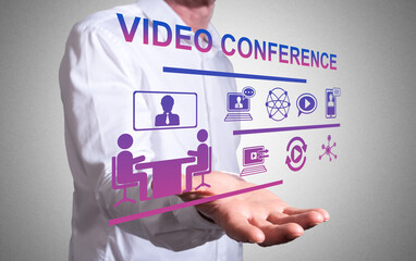 Video conference concept above a human hand