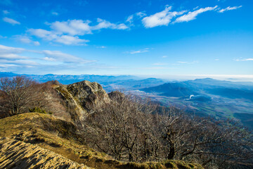 Young hiker enjoying in Puigsacalm peak, La Garrotxa, Spain