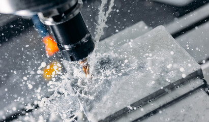 Banner Working closeup CNC turning cutting metal Industry machine iron tools with splash water, top...