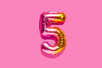 Rainbow foil balloon number. Top view.