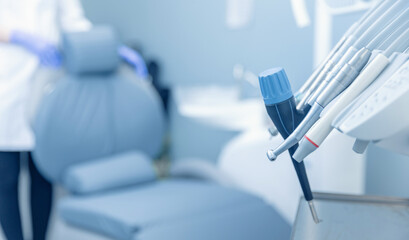 Banner dentists room office. Closeup different dental instruments and tools, blue toning