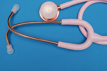 Medical stethoscope.Pink medical stethoscope.The concept of healthcare.